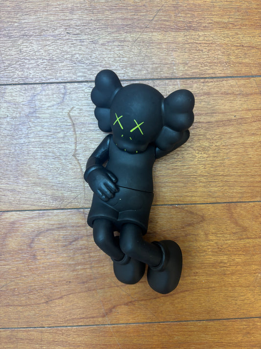 Kaws Laying Down Figure Black